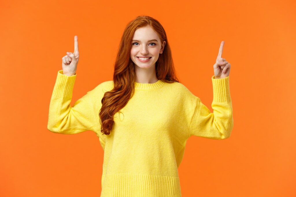 Excited and assertive, smiling confident redhead woman know exactly what need for winter holidays